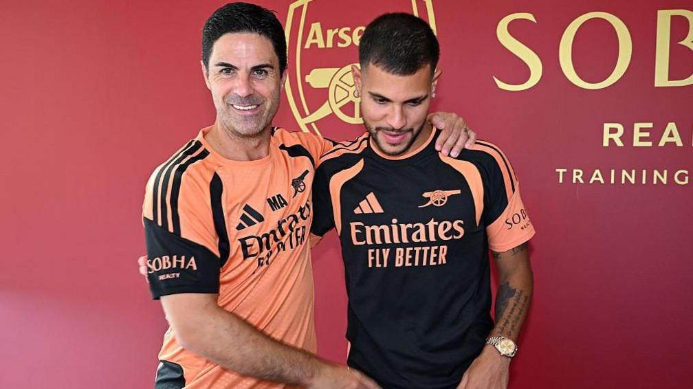 Mikel Arteta with new Arsenal signing Bruno Guimaraes