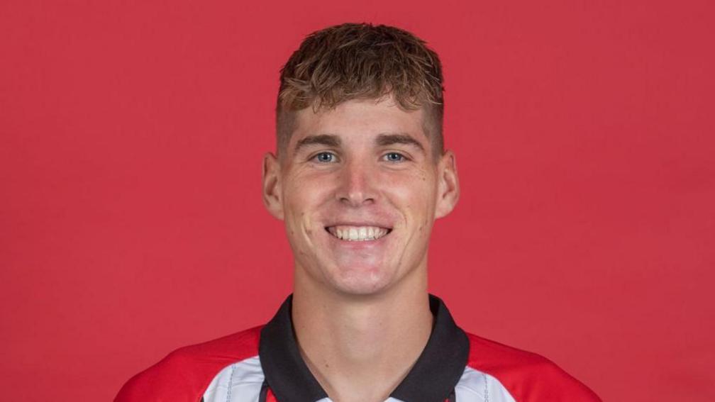 Ivan Varfolomeyev in a Lincoln City kit