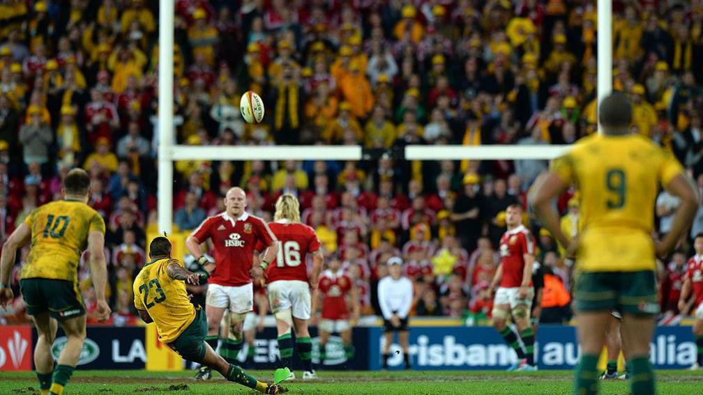 Kurtley Beale slips in 2013 against the Lions
