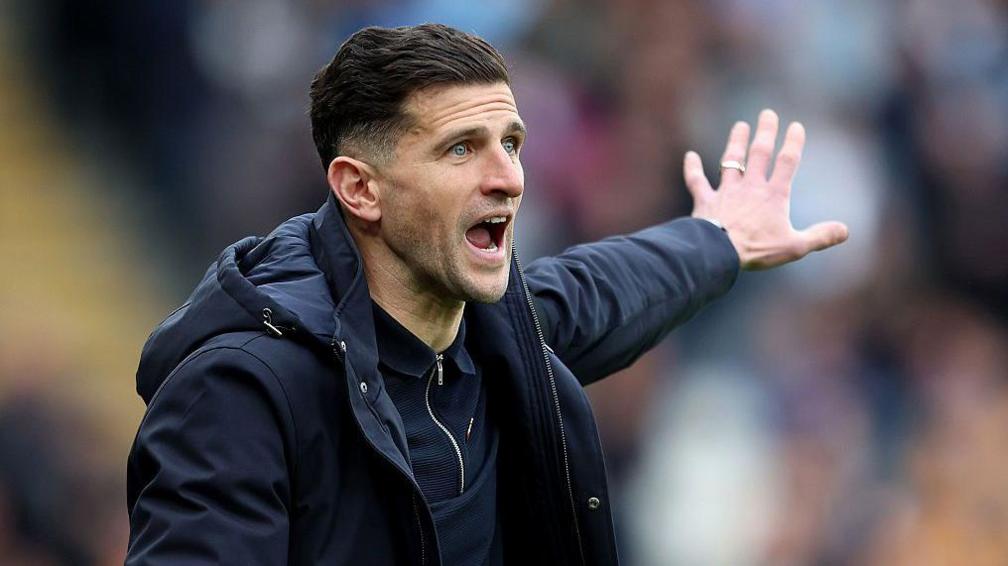 Portsmouth boss John Mousinho shouts from the sidelines