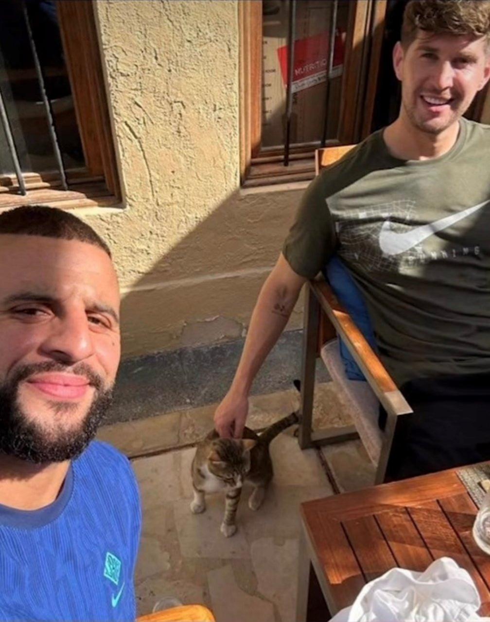 Dave the cat with Kyle Walker and John Stones