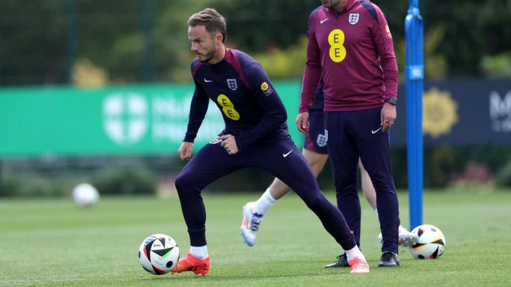 James Maddison dribbles in training