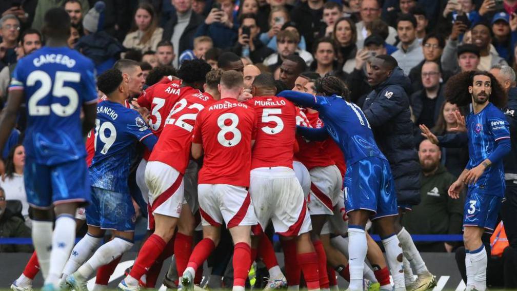 Players clash in Chelsea and Nottingham Forest's Premier League game