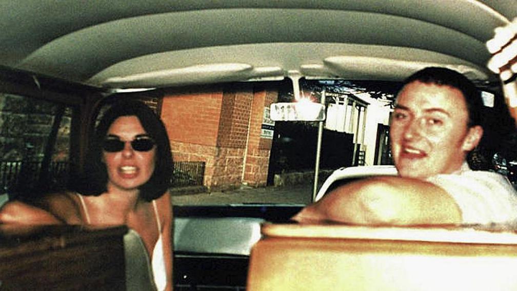 An undated handout photo shows British couple Joanne Lees (L) and boyfriend Peter Falconio as they sit in their van