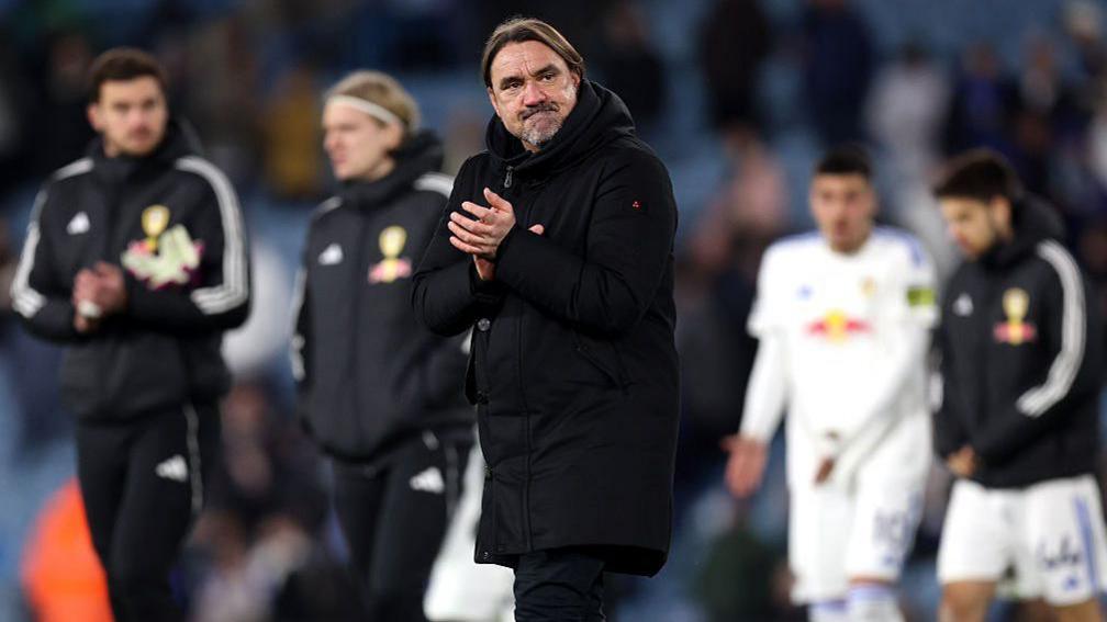 Leeds boss Daniel Farke applauds his side's fans after their last home Premier League game, a 1-0 defeat by Sunderland
