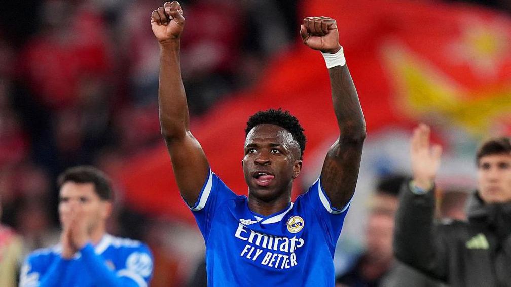 Vinicius Junior with his hands in his air