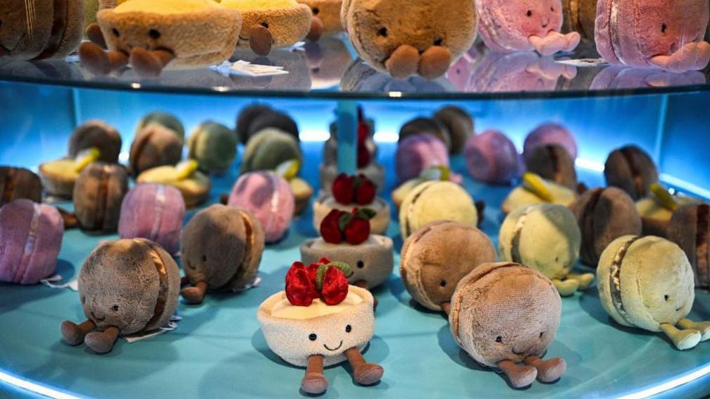 A Jellycat pastry-shaped soft toys display.