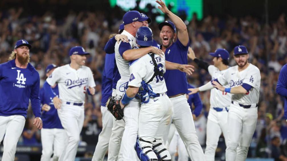 Blake Treinen and catcher Will Smith celebrate