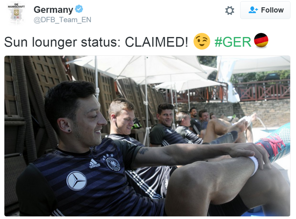 Mesut Ozil and his Germany team-mates on sun loungers by a pool