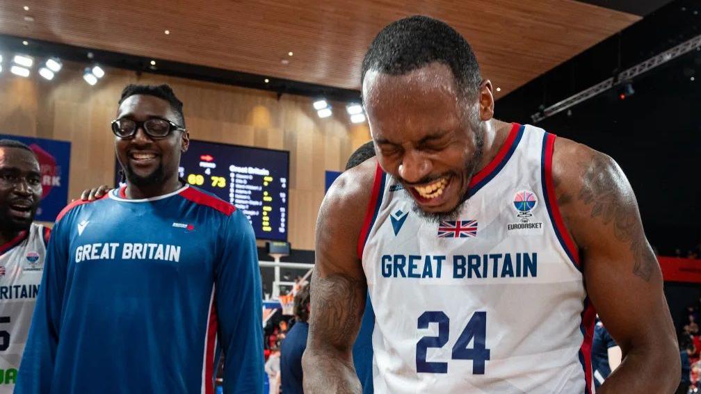Great Britain basketkball players celebrate qualifying for EuroBasket 2025 after beating the Netherlands