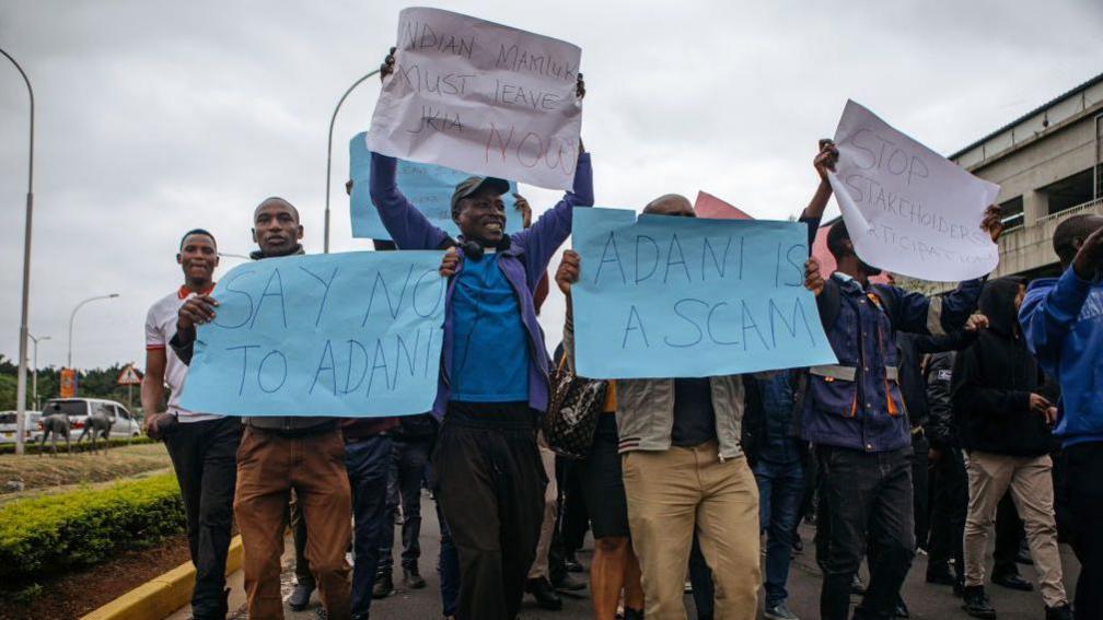 Members of the Kenya Aviation Workers Union (KAWU) picket outside Jomo Kenyatta International Airport (JKIA) over plans to sell the airport to Adani Airport Holdings Ltd., in Nairobi, Kenya, on Monday, Sept. 2, 2024. 