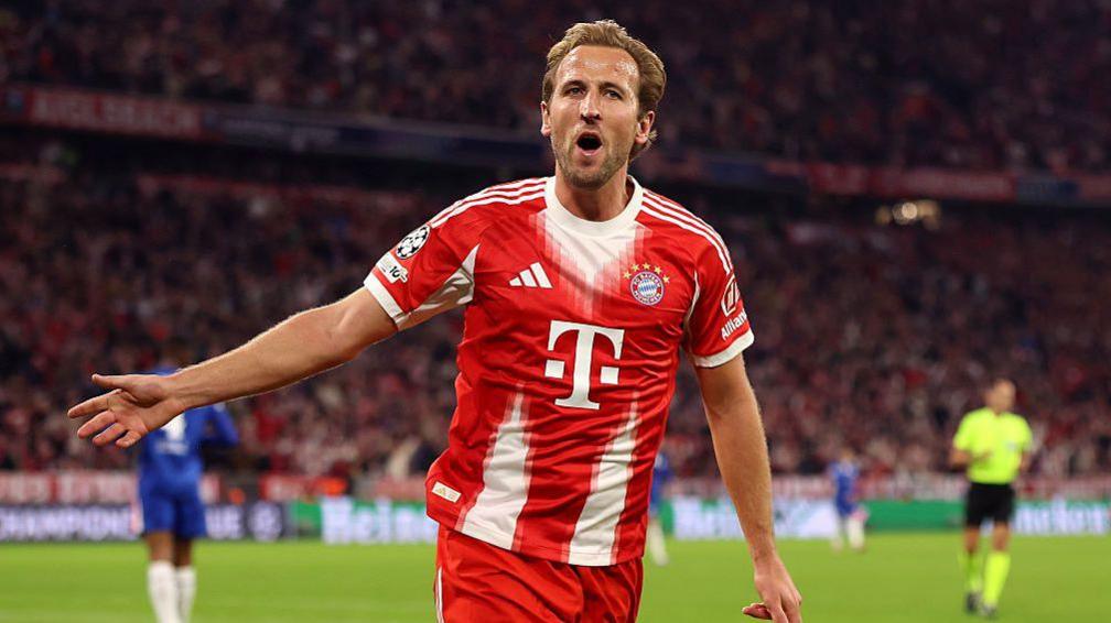 Harry Kane celebrates scoring in the Champions League