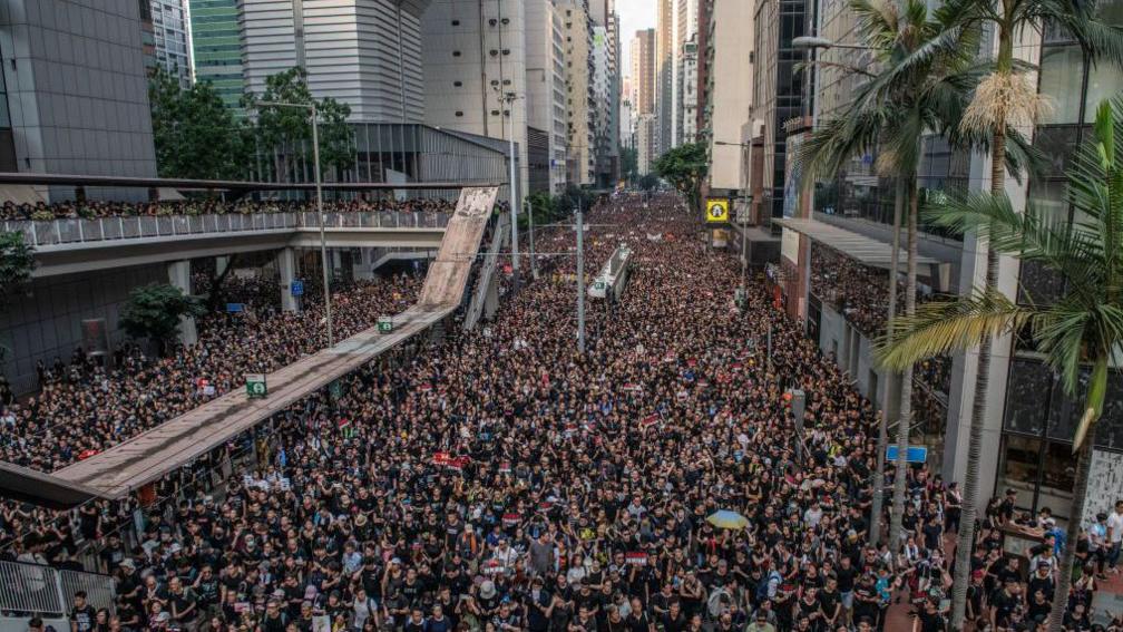 Protesters at a pro-democracy and anti-Chinese government control mass demonstration in Hong Kong on 16 June, 2019