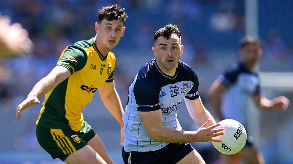 Colm Basquel is tracked by Michael Langan