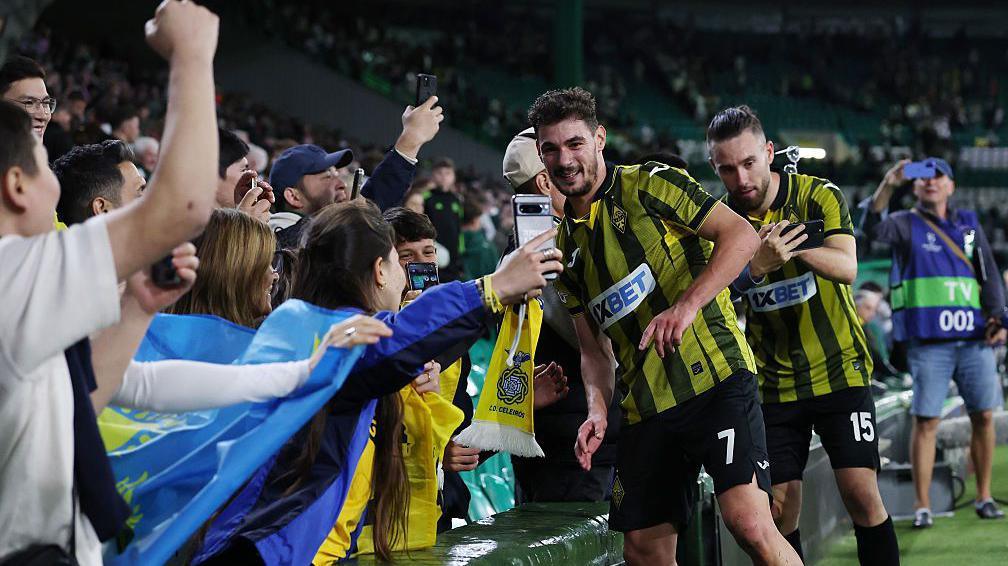 Kairat Almaty players celebrate