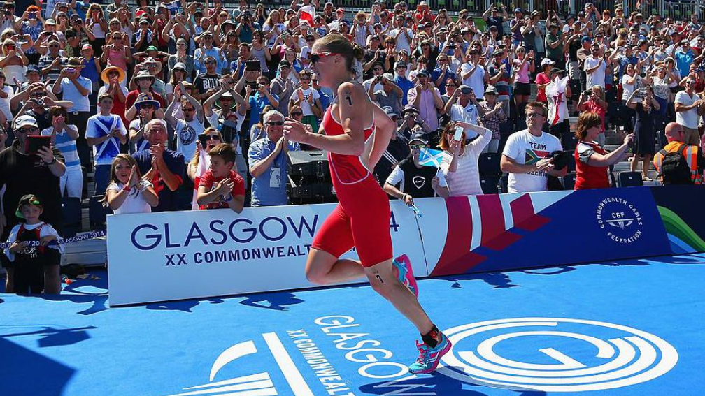 Jodie Stimpson running during the triathlon final at the 2014 Commonwealth Games.