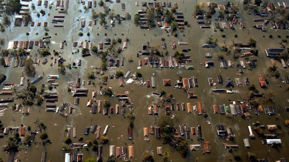 Water surrounds homes in the devastated Ninth Ward in this aerial view of damage from Hurricane Katrina in New Orleans.