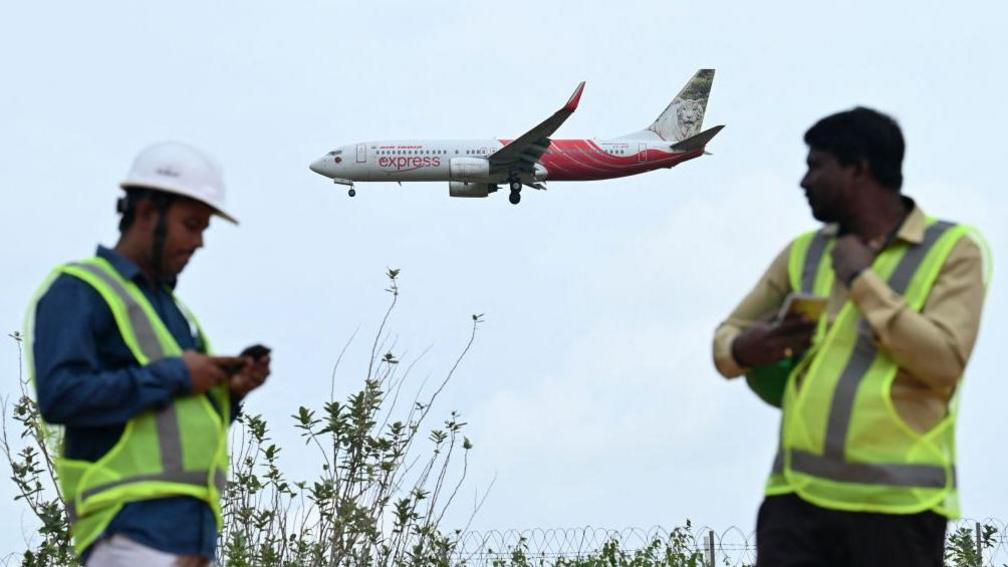 An Air India Express aircraft prepares to land at Kempegowda International Airport in Bengaluru on September 4, 2024