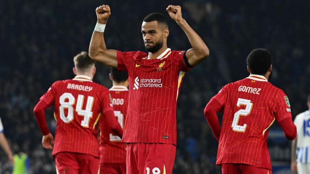 Cody Gakpo celebrates scoring for Liverpool at Brighton