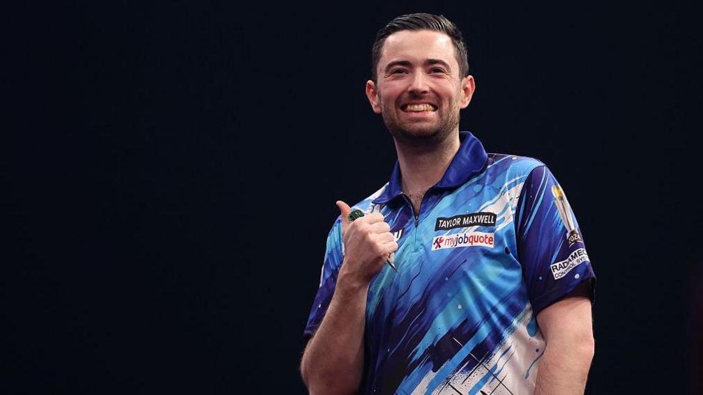 Luke Humphries smiling