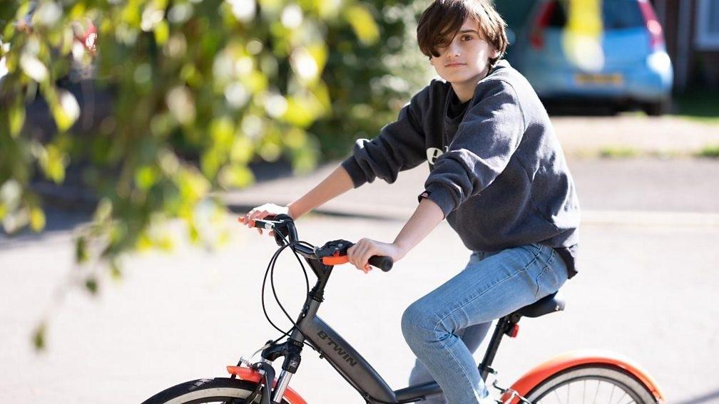 Luca Fernandes on his bicycle