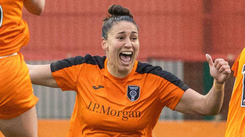 Brenna Lovera celebrates