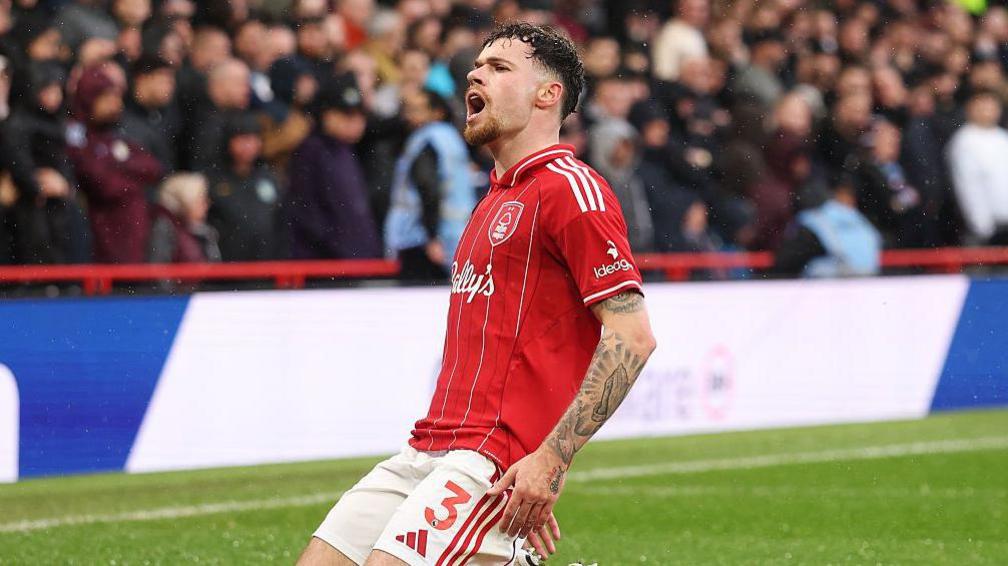 Neco Williams celebrates