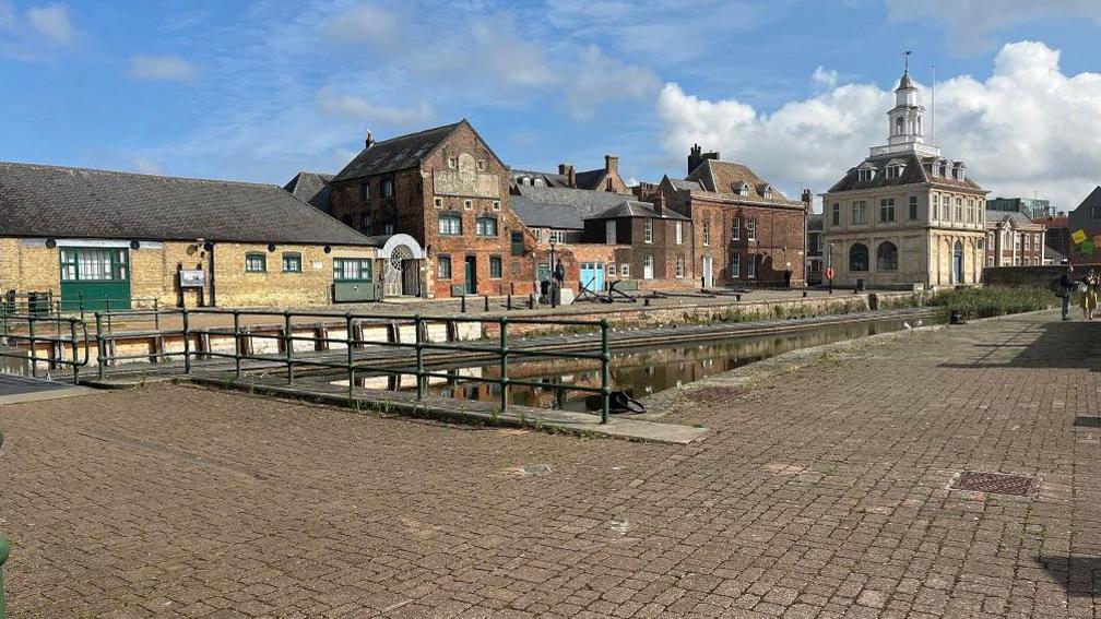 General view of King's Lynn Quayside showing some of the buildings and weigh bridges that would have been used in the 12th Century when the port was one of the most important in Britain. 