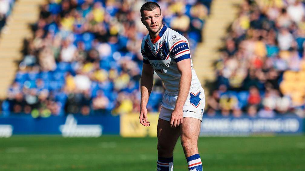 Wakefield Trinity's Max Jowitt preparing to kick for goal. 