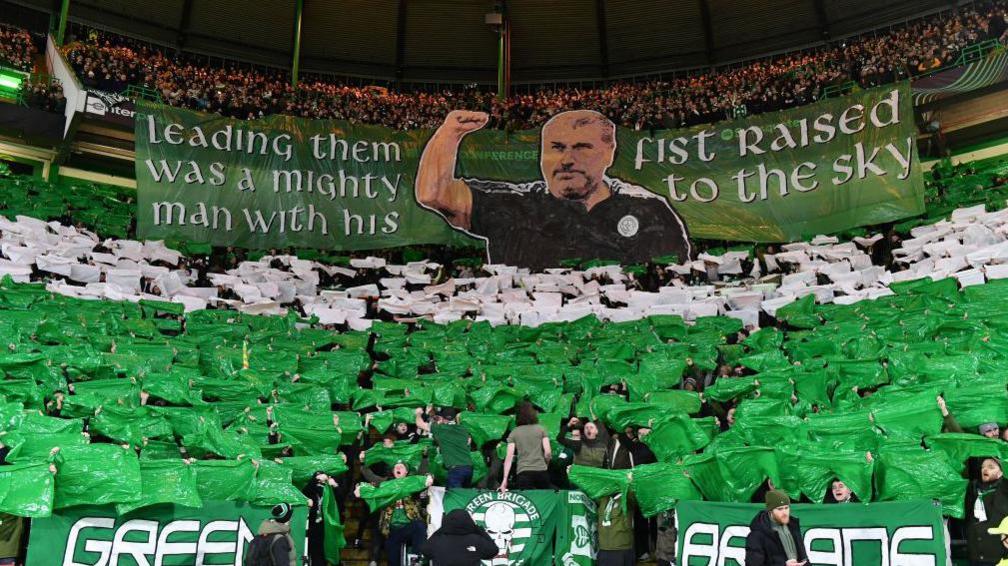 A banner showing support for Ange Postecoglou before a match between Celtic and Bodo/Glimt in 2022