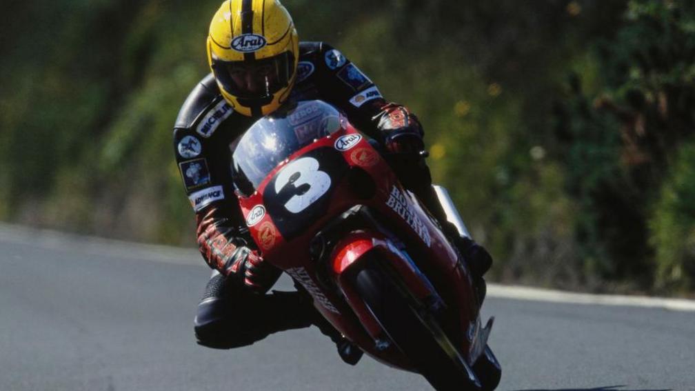 Joey Dunlop on board a 125cc Honda