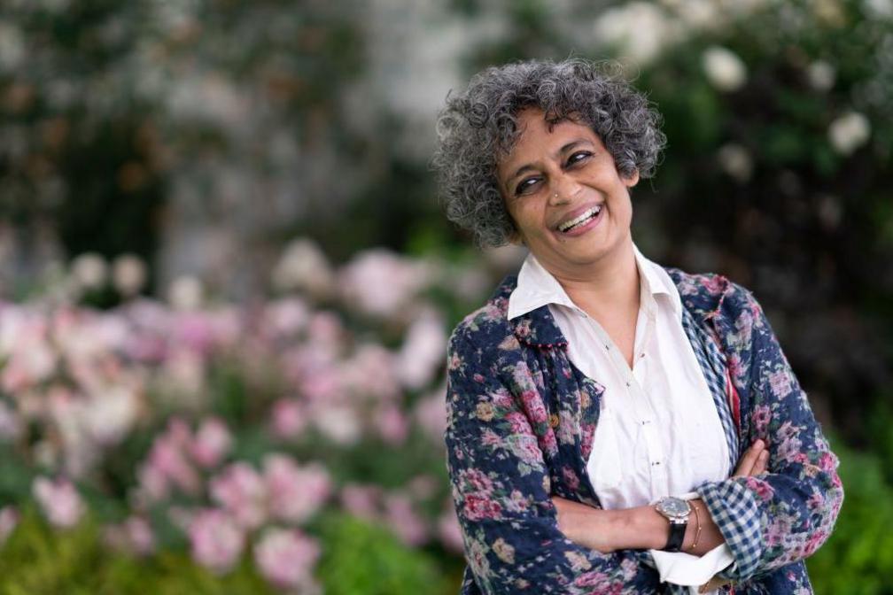 A smiling Booker-prize Indian author Arundhati Roy