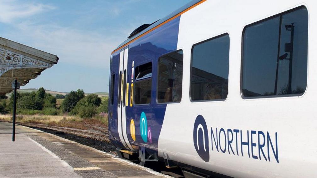 A stock image of a Northern train at a station platform.