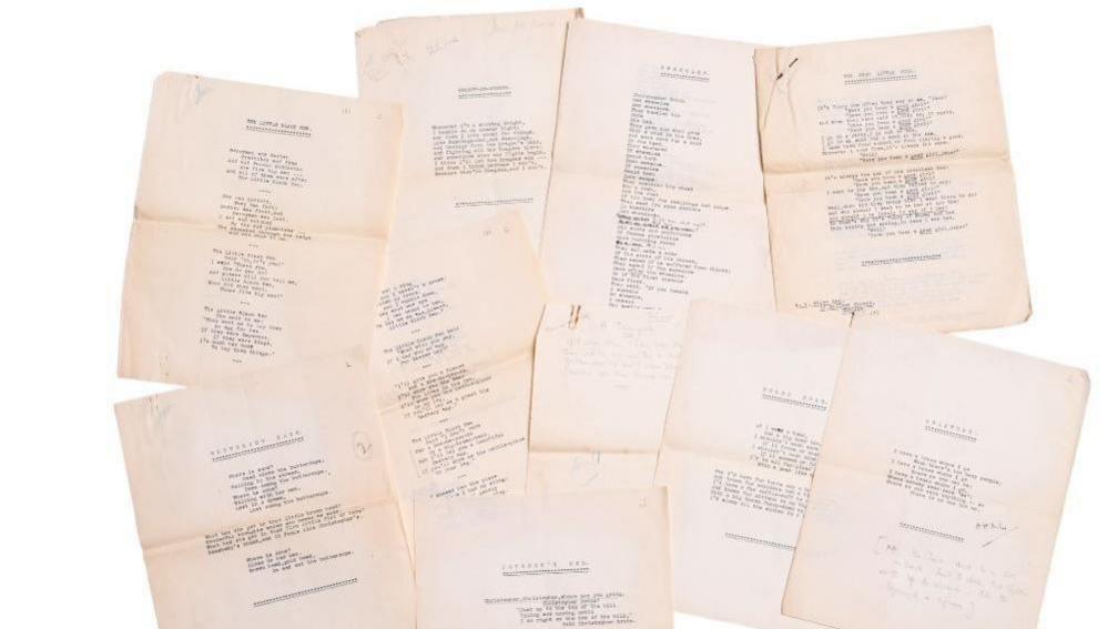 Several pieces of paper, yellowed with age, with type that is too distant to read.