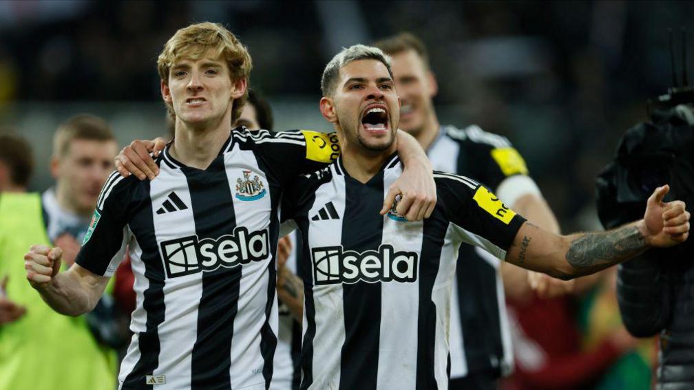 Anthony Gordon and Bruno Guimaraes celebrating after their win.