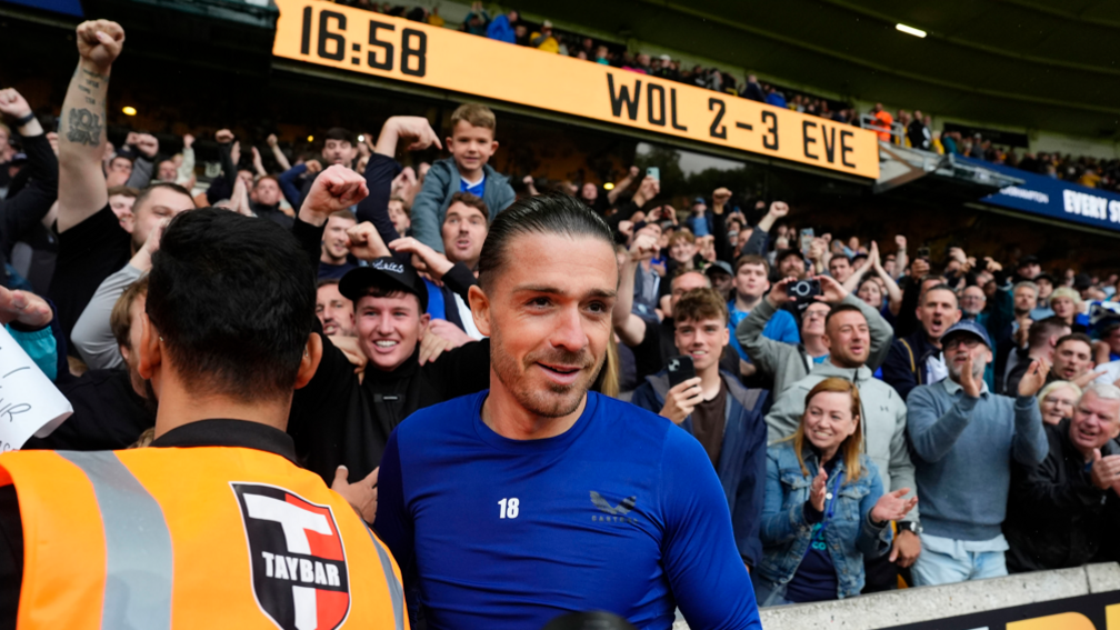 Jack Grealish is mobbed by fans at the end of Everton's 3-2 win at Wolves in the Premier League
