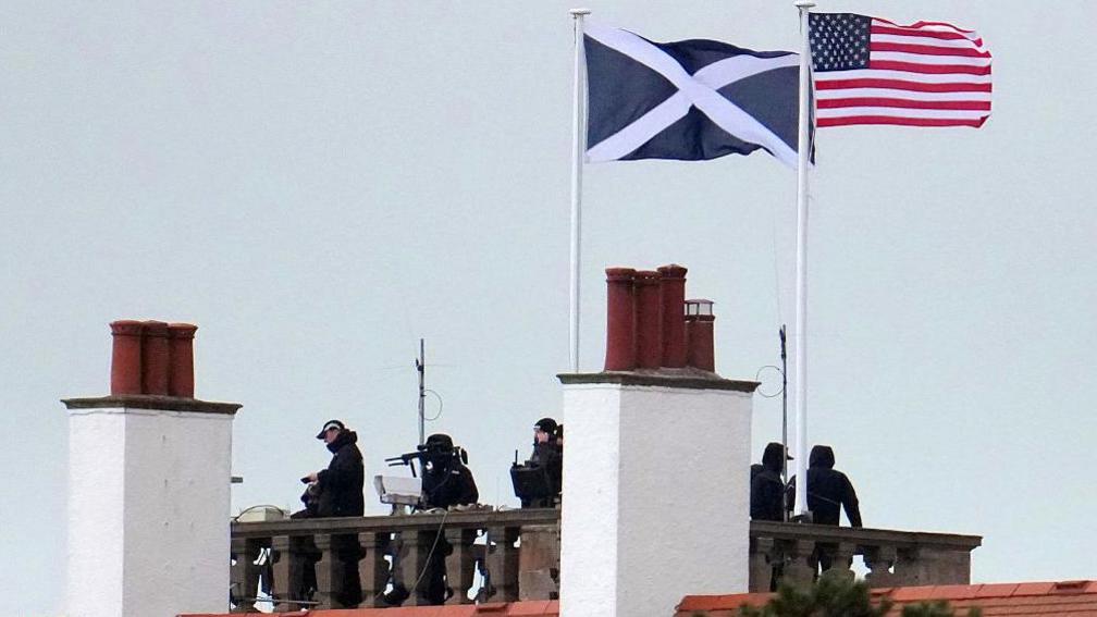 Police snipers are seen on the roof of the Trump Turnberry hotel ahead of U.S. President Donald Trump's visit on July 26, 2025 in Turnberry, Scotland.