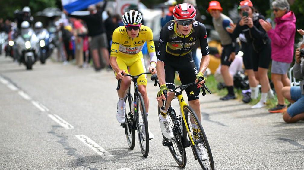 Tadej Pogacar stays close behind rival Jonas Vingegaard during stage 18