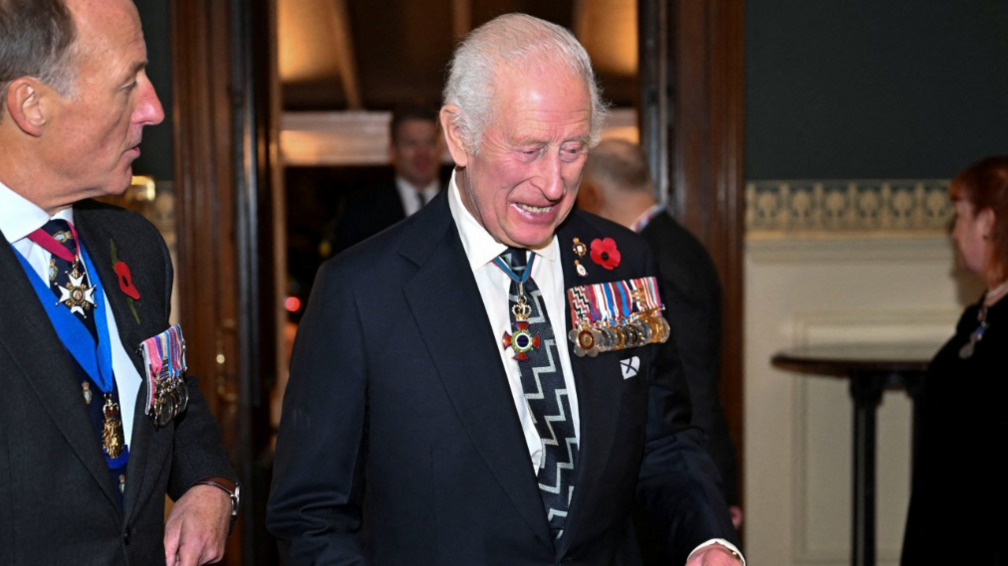 King Charles, wearing a poppy and several military medals, is seen at the Remebrance event at the Royal Albert Hall in London on 9 November