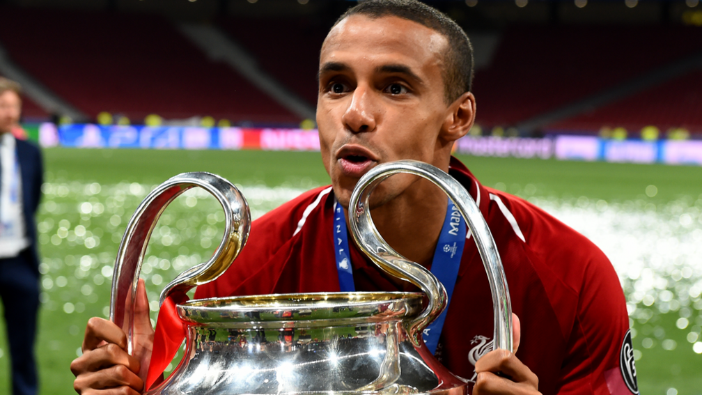 Liverpool defender Joel Matip with the Champions League trophy after helping his side defeat Tottenham in the final in 2019.