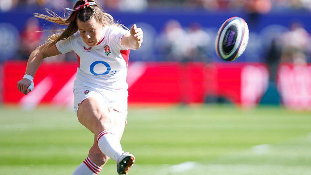 Zoe Harrison kicking for England