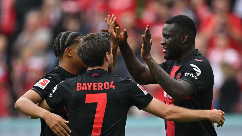 Bayer Leverkusen celebrate Victor Boniface's opener