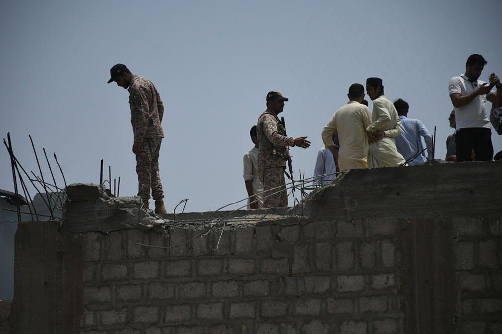 Security forces inspect area after Indian drone strike on Karachi, Pakistan on May 08, 2025.