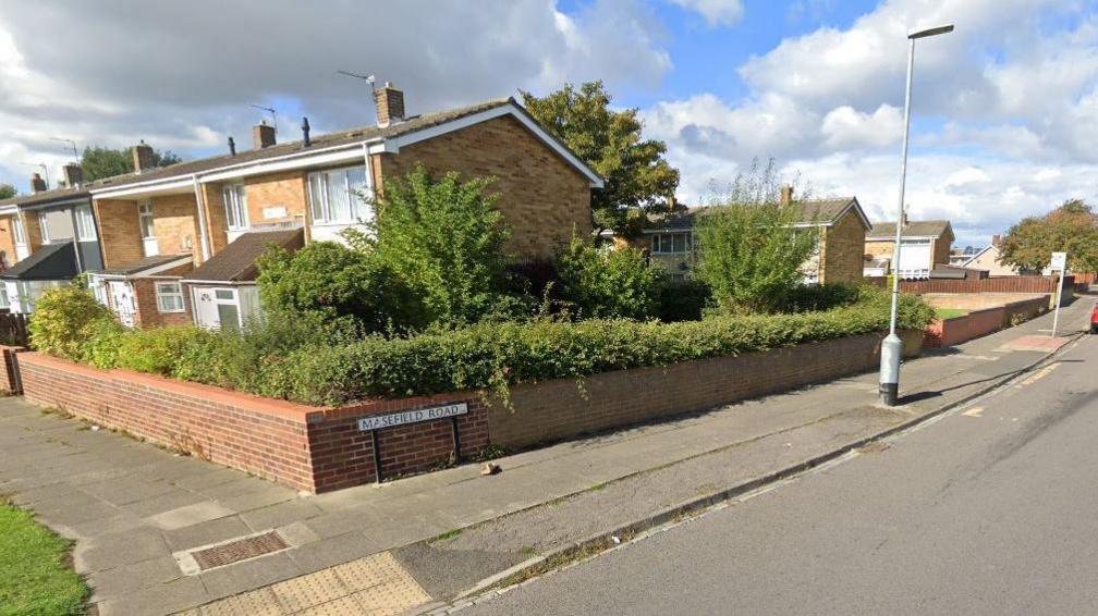 Masefield Road's street sign