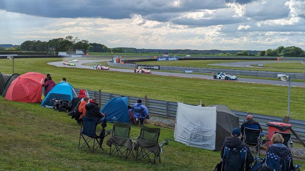 Spectators watching racing from Palmer Corner at Snetterton Circuit