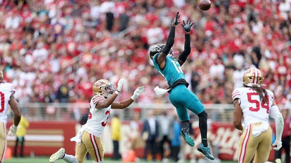 Travis Hunter makes a catch for the Jacksonville Jaguars against the San Francisco 49ers
