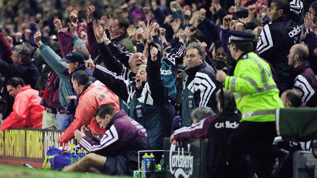 Contrast of emotions on the Liverpool and Newcastle benches