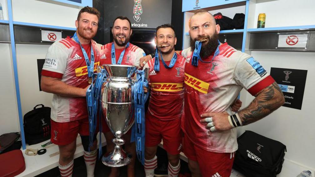 From left, Stephan Lewies, Will Collier, Danny Care and Joe Marler pose with the Premiership trophy in 2021