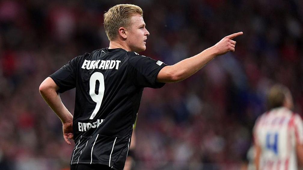 Jonathan Burkadt celebrates