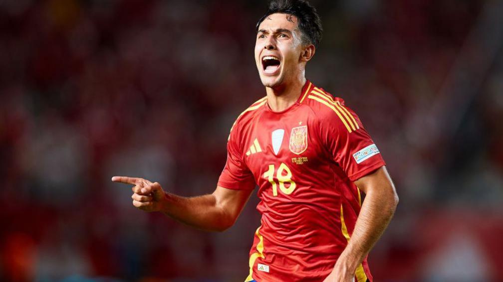 Martin Zubimendi celebrates